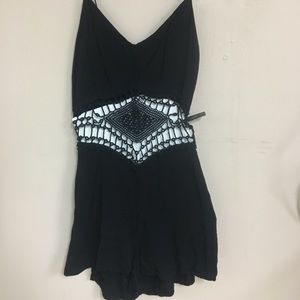 Black romper with patterned cut out stomach